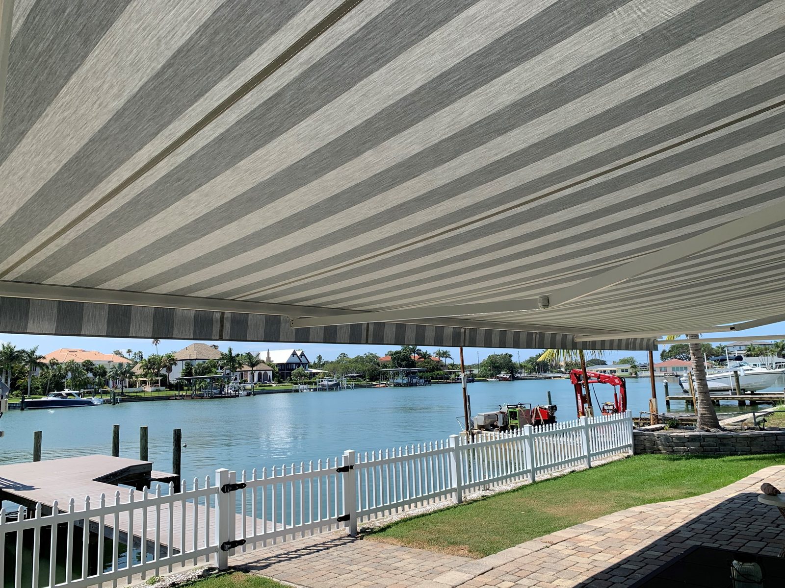 Retractable awning shading an outdoor patio